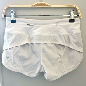 Lululemon “speed up” running shorts size 2 in the color white.
